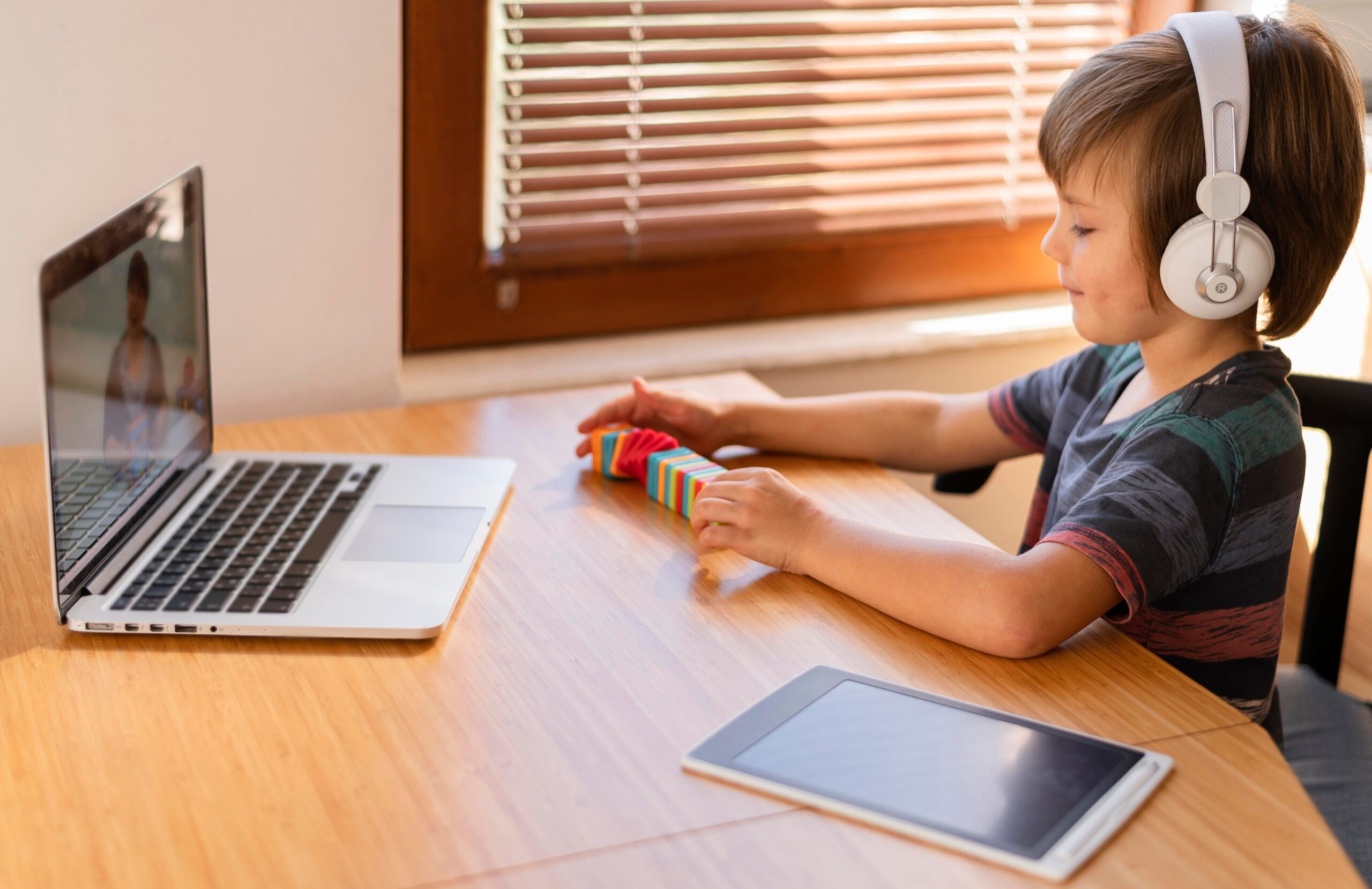 boy arranging some toys online classes 1 scaled