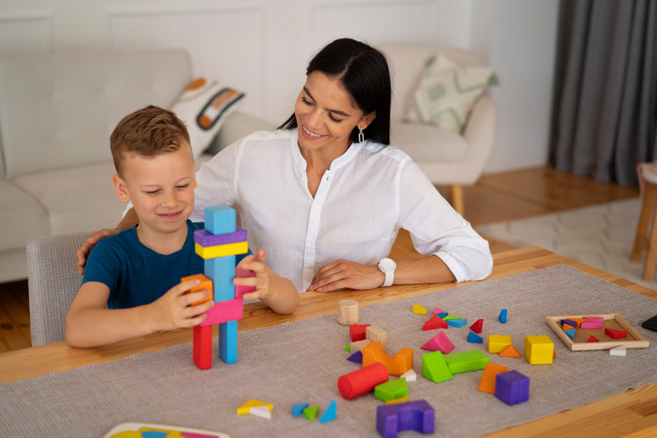 child with their mom playing brain teaser 3 scaled
