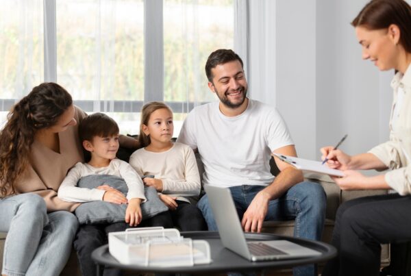 close up family talking therapist 2 1