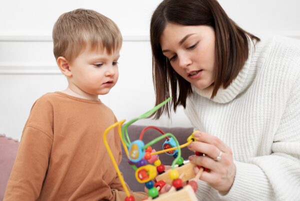 medium shot mother child with game 1