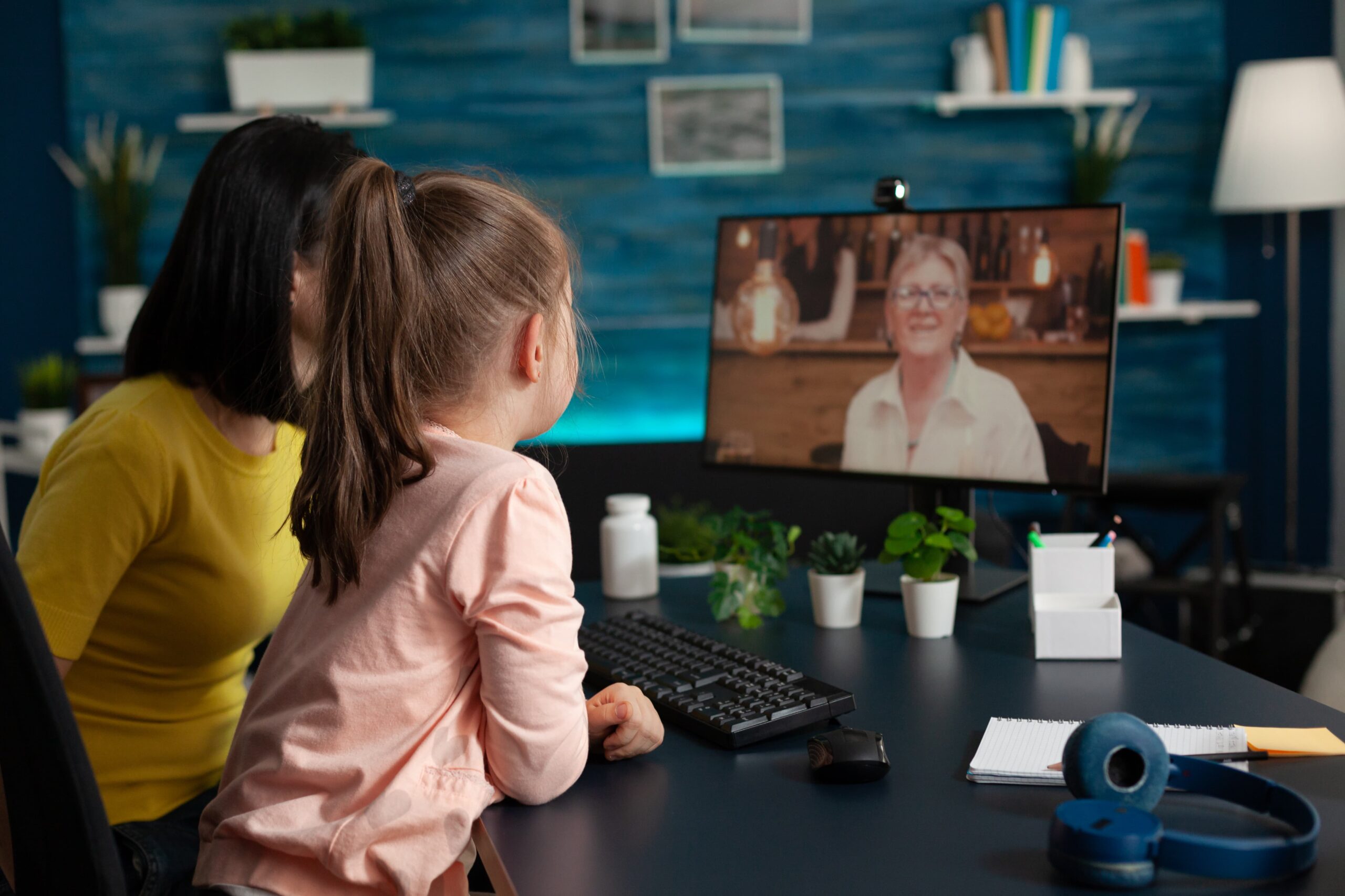 parent little kid meeting with grandma video call 1 scaled