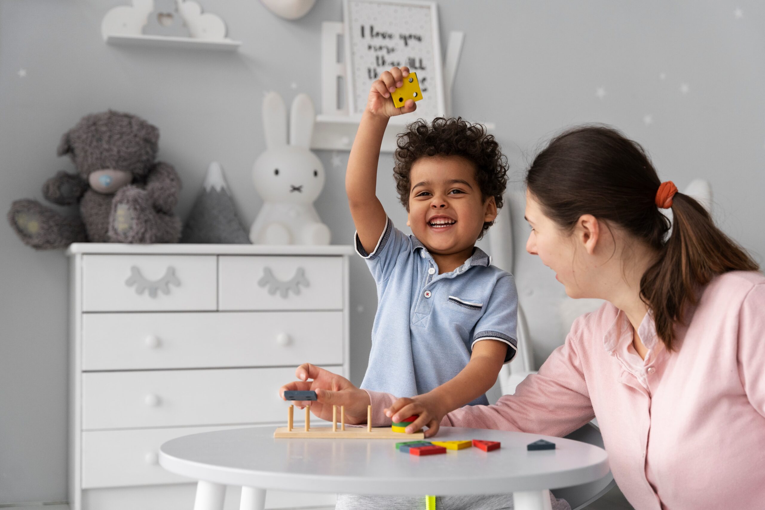 close up child enjoying didactic game 1 scaled
