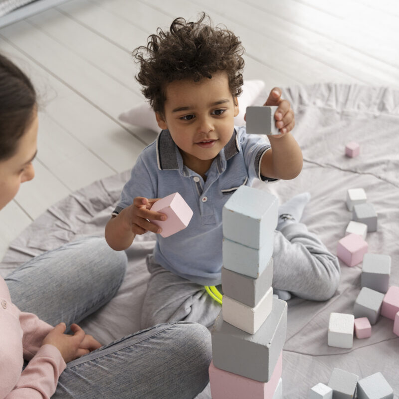 close up child enjoying didactic game 3