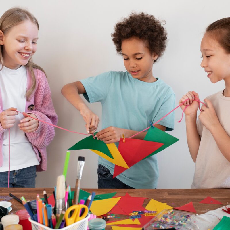 young kids making diy project from upcycled materials 1